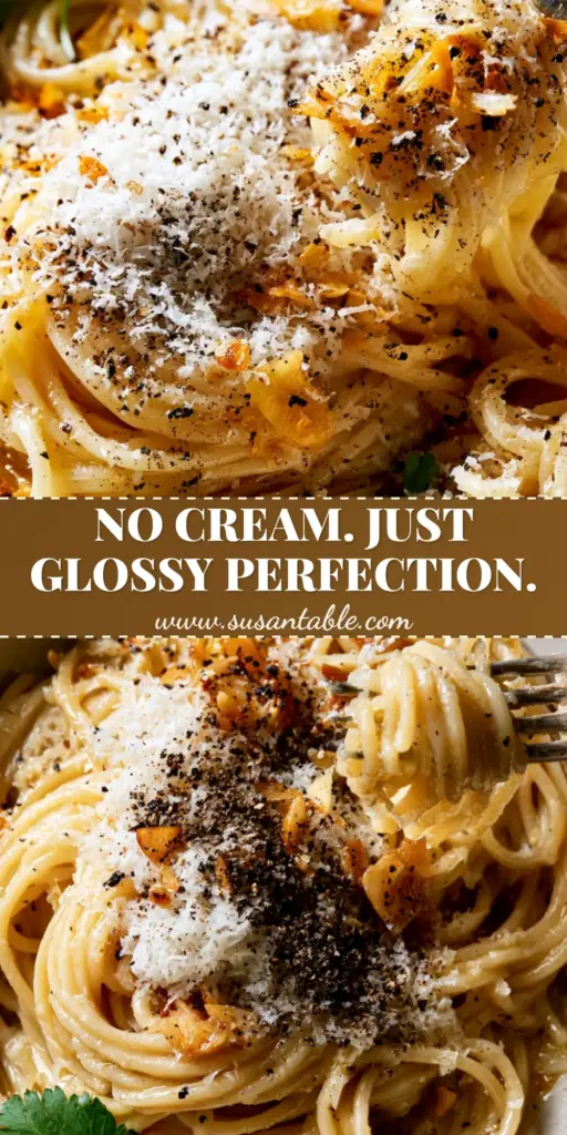 A close-up high-angle shot of a rustic bowl of spaghetti with a shimmering garlic parmesan emulsion, microplaned cheese snow, and toasted garlic slivers. (Creamy Pasta Recipe)