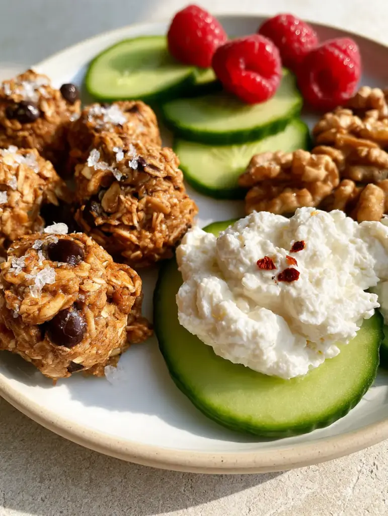 Crisp cucumber slices topped with a thick dollop of whipped feta and red chili flakes. (snack recipes)