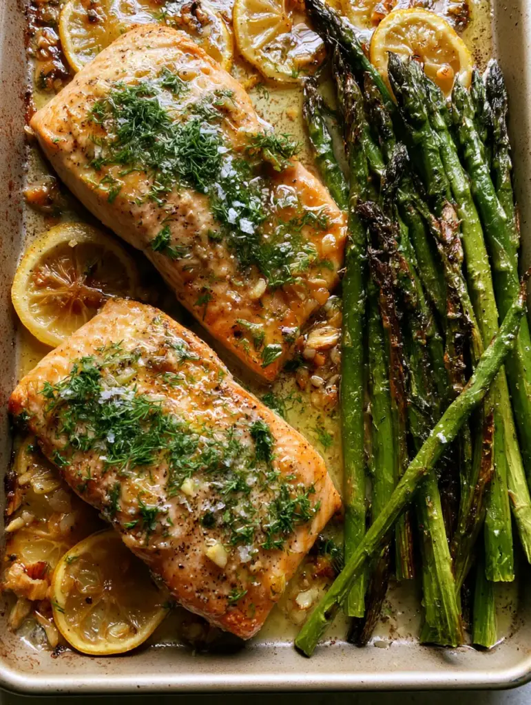 Baked Salmon with Asparagus: The Ultimate Sheet Pan Dinner Guide 1 Sheet pan featuring caramelized lemon slices and roasted minced garlic over baked salmon with asparagus.